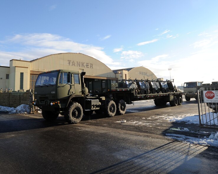 Equipment gets trucked to the Grant County International Airport in Moses Lake, Wash., Jan. 8 as part of the bases relocation to the area. (U.S. Air Force photo/ Tech. Sgt. J.T. May)