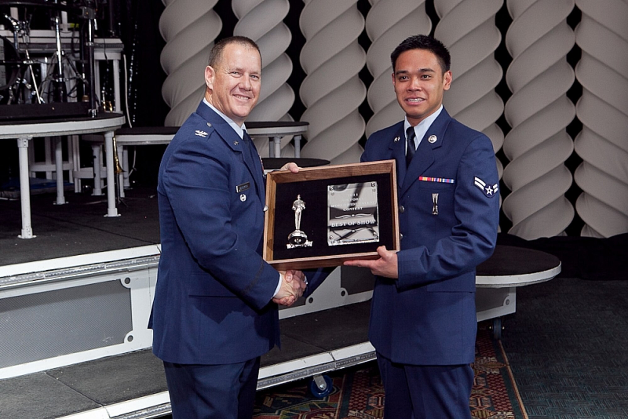 LACKLAND AFB, TEXAS -- Airman 1st Class Jonathan Salvador, 17th Munitions Squadron air launched cruise missile maintenance team member was named best in show and top musician at the Air Force Worldwide Talent Search Dec. 14, 2010. He performed a rendition of the song “Smooth” by musician Carlos Santana at the AFWTS competition. 