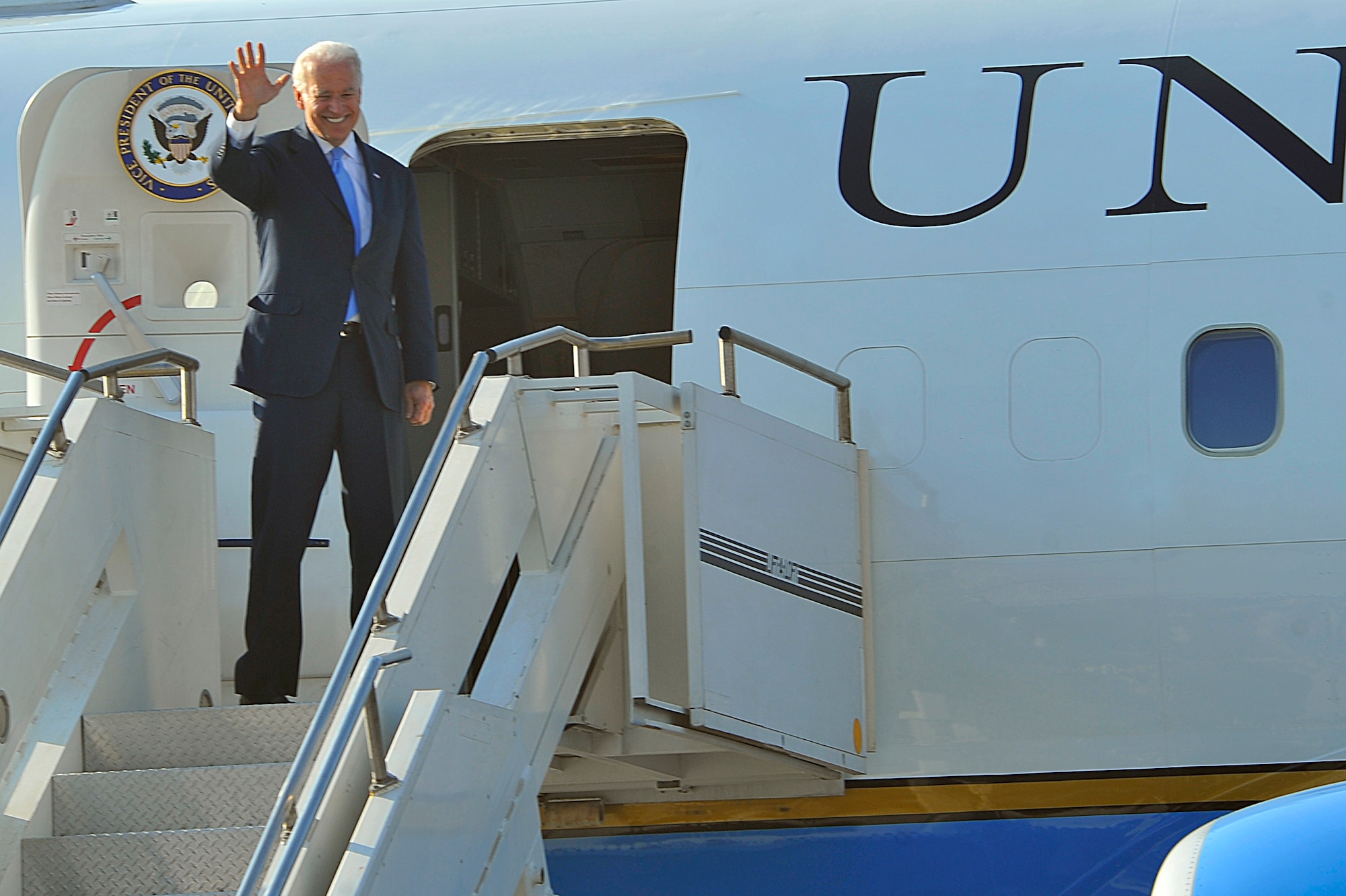 Vice President Joe Biden bids farewell as he departs at Bagram Airfield, Afghanistan, Jan. 12, 2011. Vice President Biden arrived in Afghanistan on an unannounced visit to assess progress toward the transition to Afghan-led security and to demonstrate the United States' commitment to a long-term partnership with Afghanistan. (Air Force photo/Senior Airman Sheila deVera)