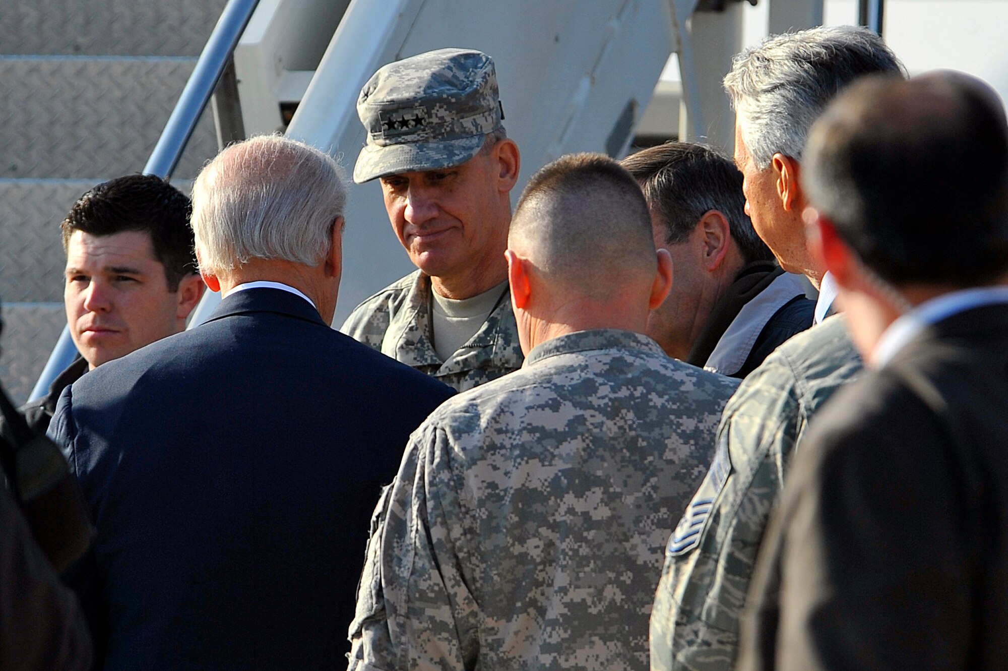 U.S. Army Lt. Gen. David Rodgriguez, Commander of the International Security Assistance Foce Joint Command, talks to Vice President Joe Biden during his short visit here at Bagram Airfield, Afghanistan. Vice President Biden arrived in Afghanistan on an unannounced to demonstrate the United States' commitment to a long-term partnership with Afghanistan.(Air Force photo/Senior Airman Sheila deVera)