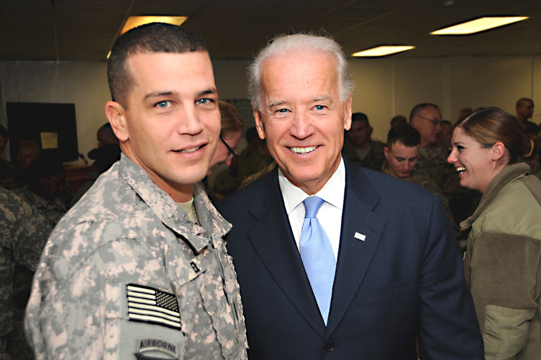 U.S. Vice President Joe Biden talks with U.S. Army 1st Sgt. Wesley M. Erb during his visit to Bagram Airfield, Afghanistan, Jan. 12, 2011. Erb is assigned to 1st Battalion, 265th Air Defense Artillery Regiment.