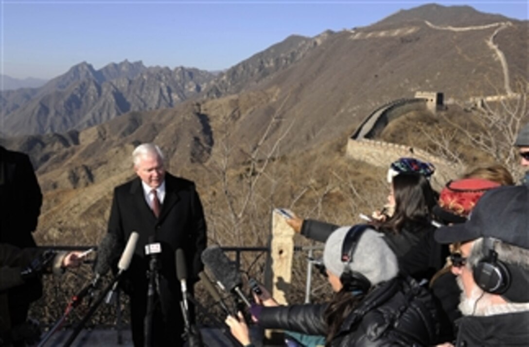 Secretary of Defense Robert M. Gates talks with the press on the Great Wall of China in Mutianyu, China, on Jan. 12, 2011.  Gates wrapped up a 4-day trip to China by visiting the People's Liberation Army 2nd Artillery Group and the Great Wall.  