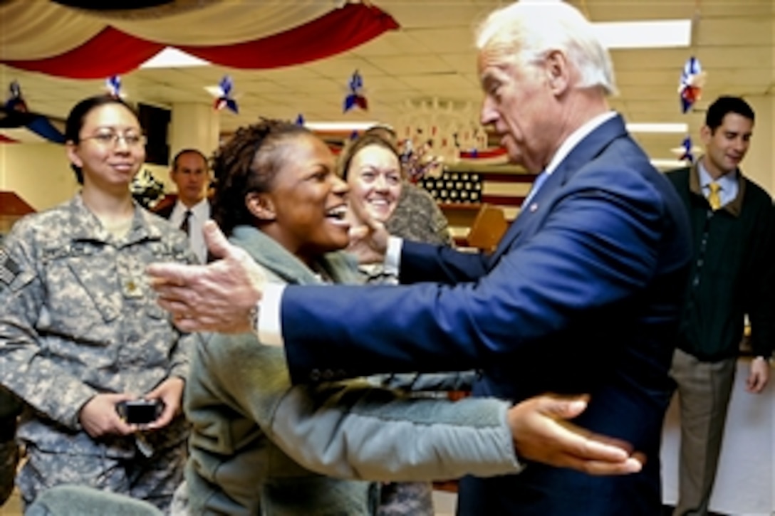 U.S. Army Sgt. Teryeshia Wilson greets U.S. Vice President Joe Biden during his visit to Bagram Airfield, Afghnanistan, Jan. 12, 2011.