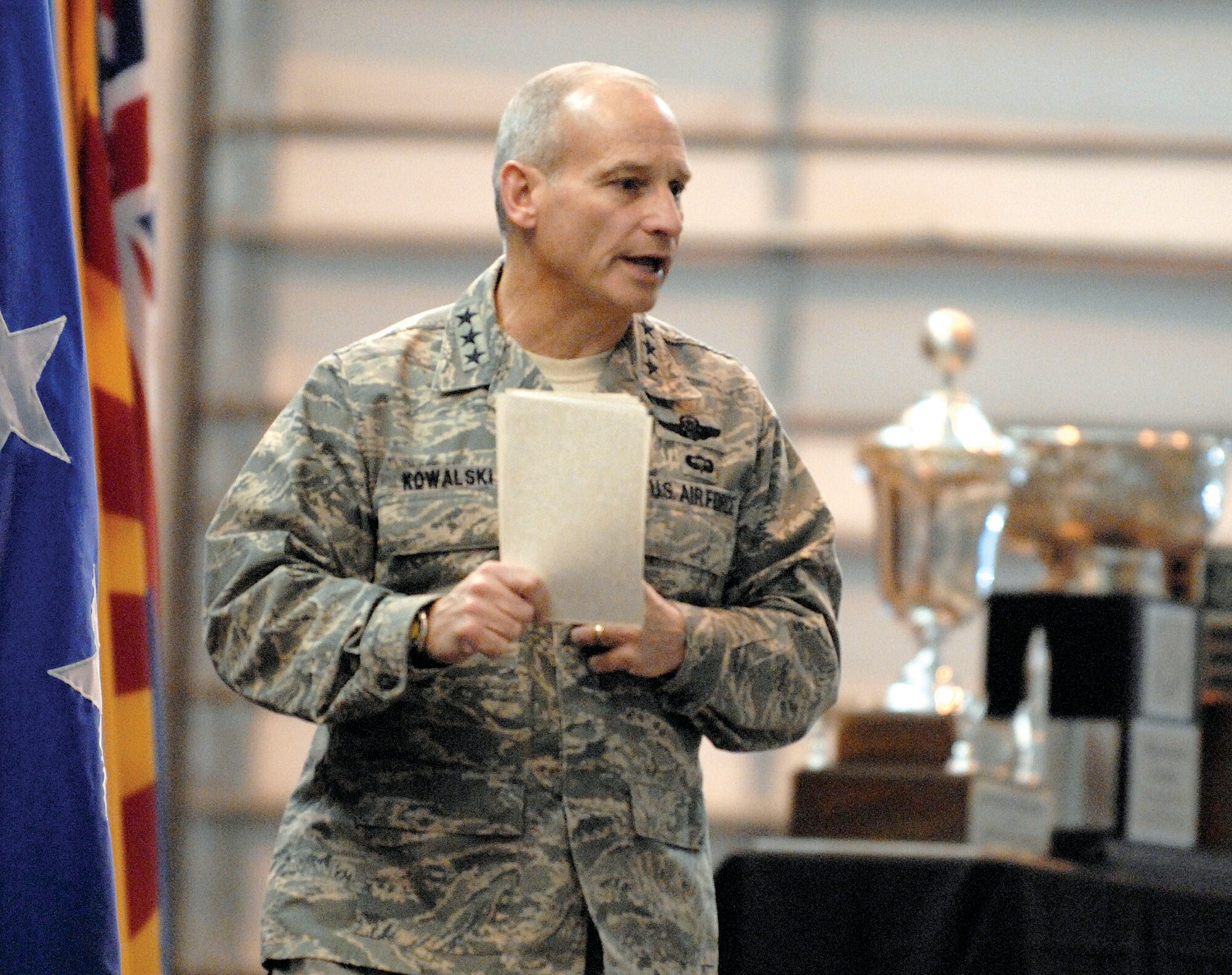 Lt. Gen. Jim Kowalski, commander, Air Force Global Strike Command, addresses the Airmen of F. E. Warren Air Force Base, Wyo., on Jan. 11. General Kowalski, who accepted command of AFGSC on Jan. 6, visited Warren as part of a command familiarization tour. Also featured in the photo are the 90th Missile Wings’s Blanchard, Blackburn and Best (ICBM) Missile Operations Trophies, earned during Global Strike Challenge. (U.S. Air Force photo by R.J. Oriez)