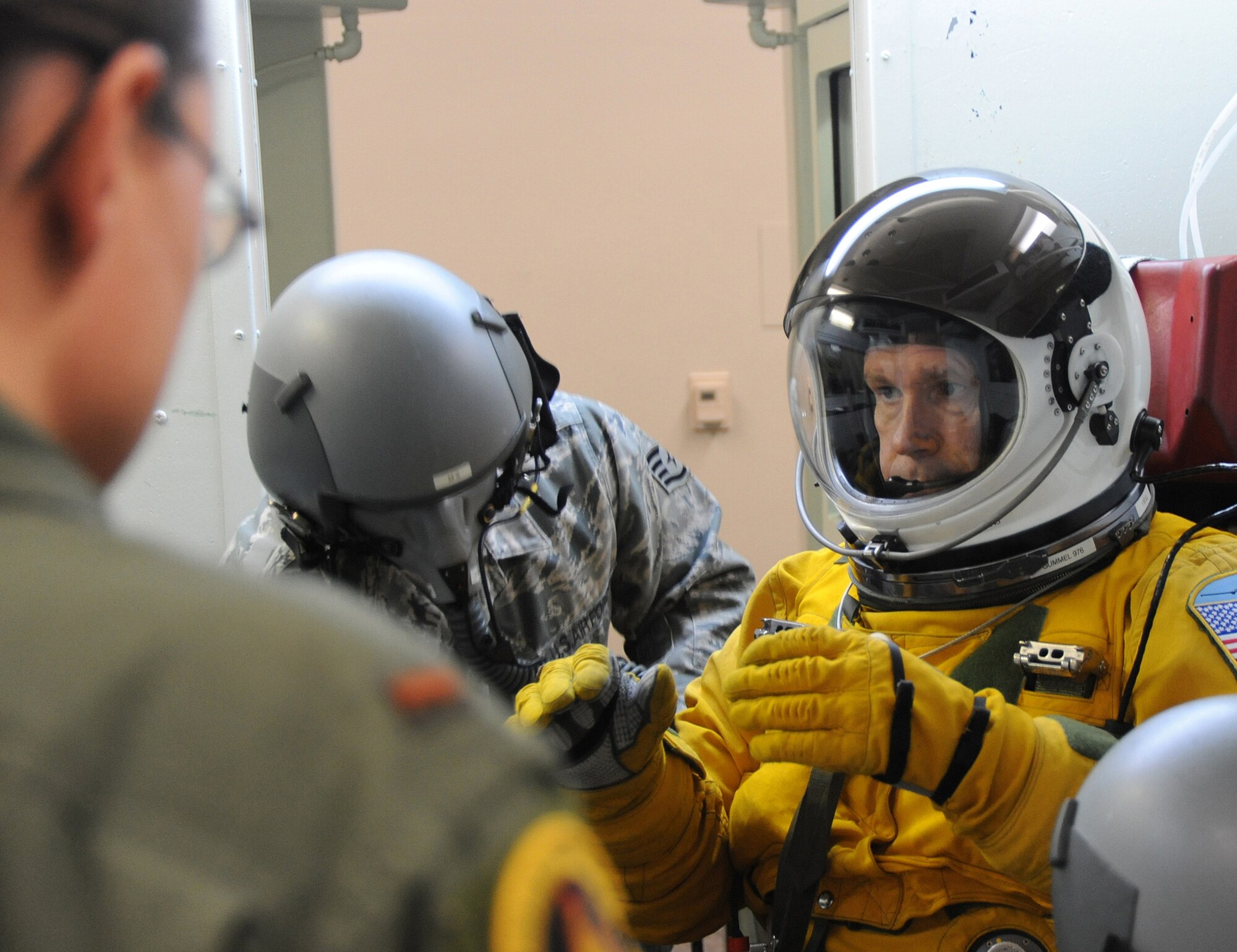 Gen. William M. Fraser III, commander of Air Combat Command, gets strapped into the high-altitude chamber at Beale Air Force Base, Calif., Jan. 10 for a decompression test. The chamber session familiarized the general with the pressure suit and flying at high altitudes. (U.S. Air Force photo/9th Reconnaissance Wing Public Affairs)