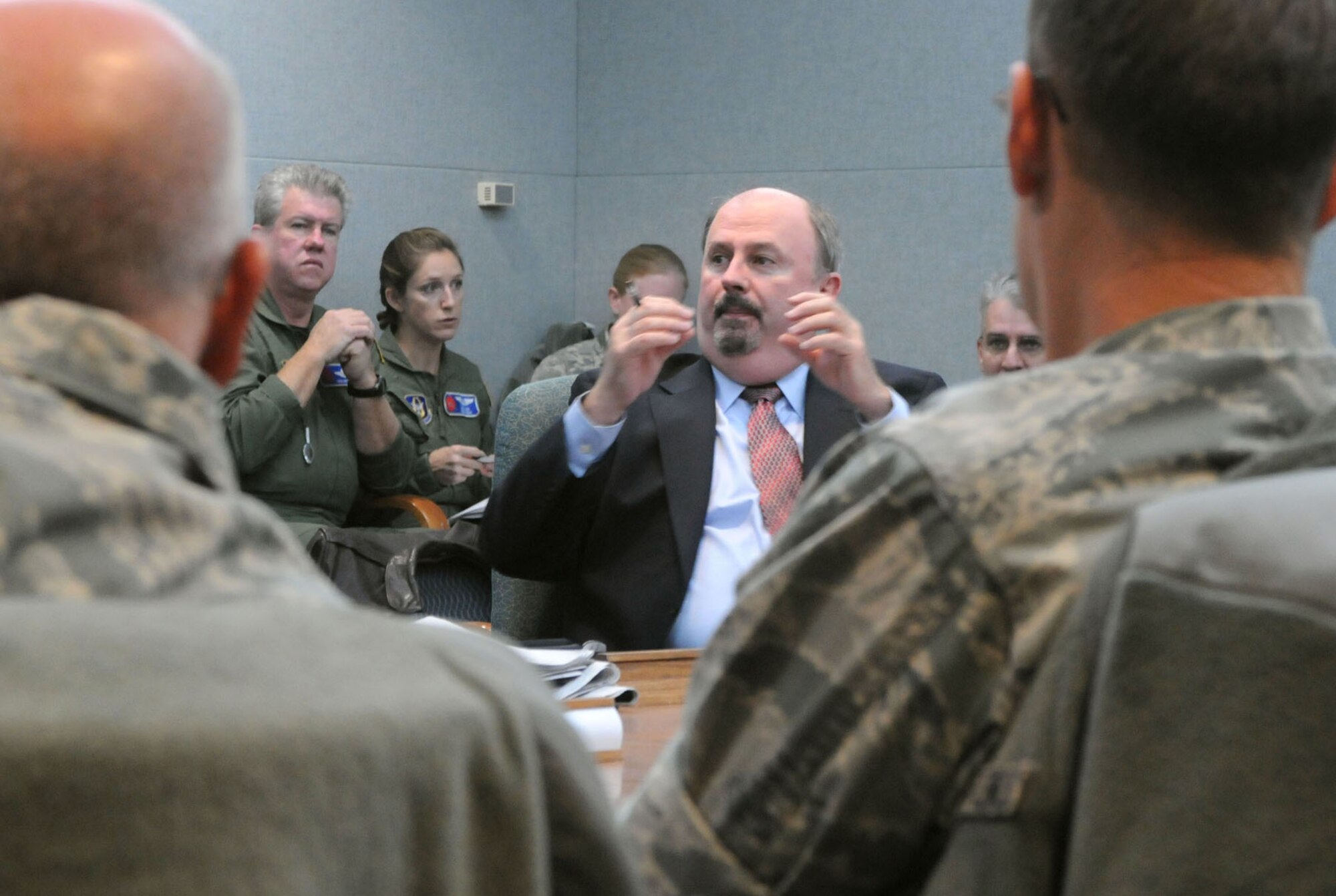 Thomas LaCrosse, director of Defense Support of Civil Authorities in the Office of the Assistant Secretary of Defense for Homeland Defense in America's Security Affairs, discusses issues concerning special missions in the Air Force Reserve Command. Airmen and aircraft from the 302nd Airlift Wing here,  403rd Wing, Keesler Air Force Base, Miss., and the 910th Airlift Wing, Youngstown Air Reserve Base, Ohio, convened at Peterson AFB for the first ever AFRC C-130 Special Missions conference Jan. 12-13. The conference was designed to share lessons learned, review policies and procedures, and tackle common support and wing issues involved with the aerial firefighting, weather reconnaissance and  aerial spray missions. (U.S. Air Force photo/Capt. Marnee A.C. Losurdo)