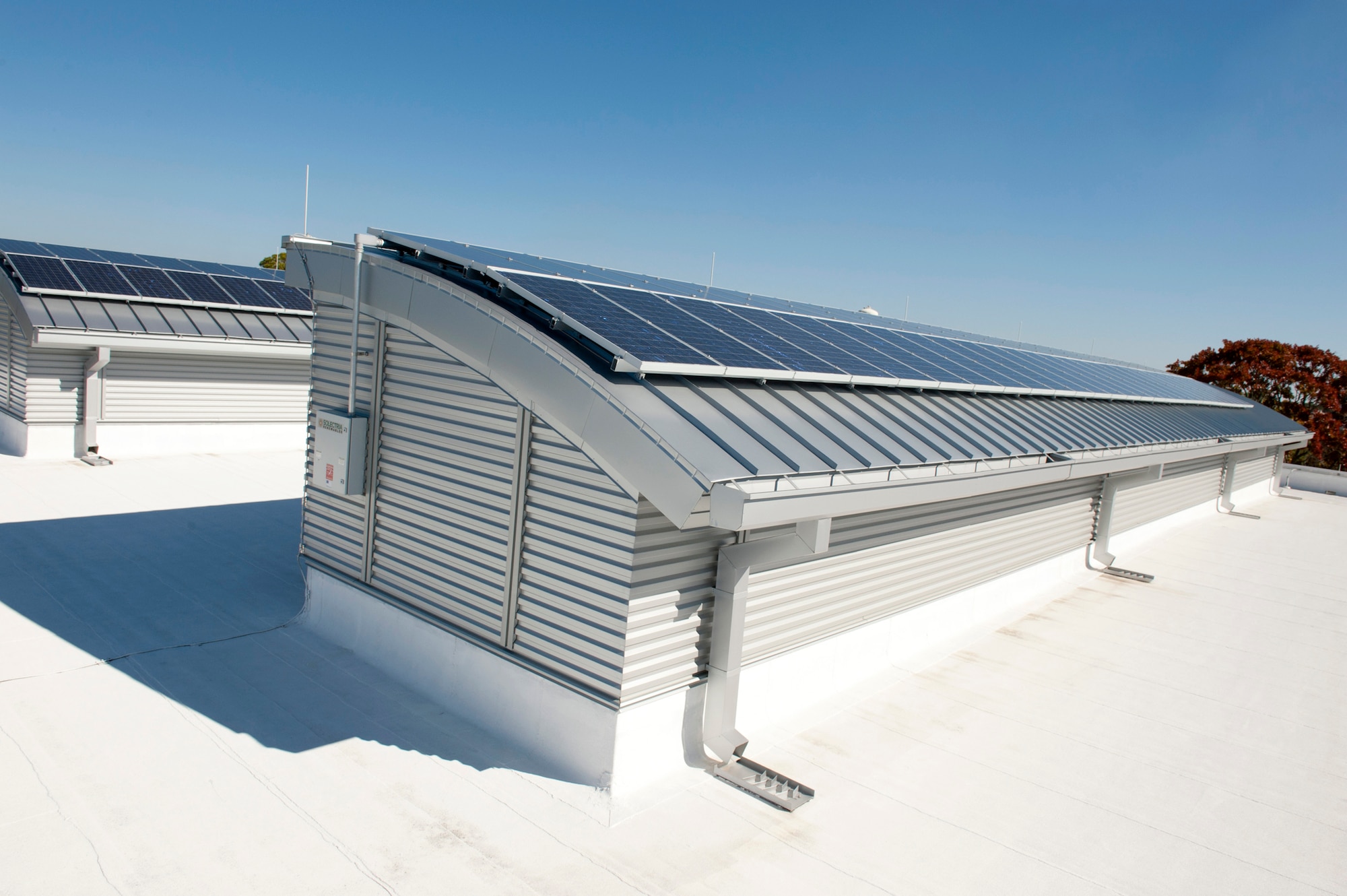 Officials at Tyndall Air Force Base, Fla., opened a new fitness center Aug. 20, 2010, that is expected to reach the U.S. Green Building Council's Leadership in Energy and Environmental Design Platinum level thanks to energy savings and environmentally friendly technologies, including these solar panels, or photovoltaics. The building also features cool-roof technology and a solar-generated hot-water system which are expected to help achieve a 9-percent energy savings for the building. (U.S. Air Force photo/Jonathan Green)