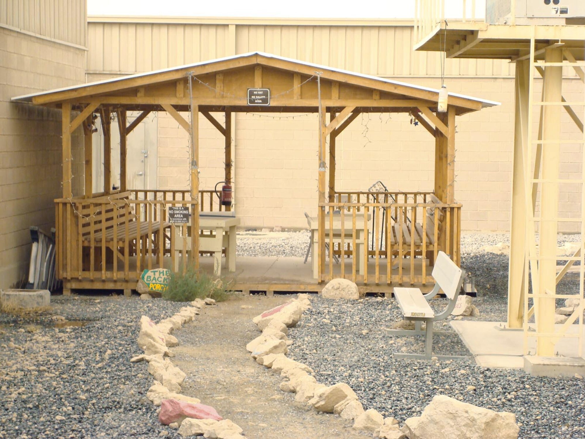 The 386th Expeditionary Medical Group's gazebo and patio before Col. Reynold D'Lima created a desert garden using local plants, vegetation and seeds from fruits and vegetables collected from the dining facility. Colonel D'Lima is a provider assigned to the 386th EMDG. (Courtesy photo)