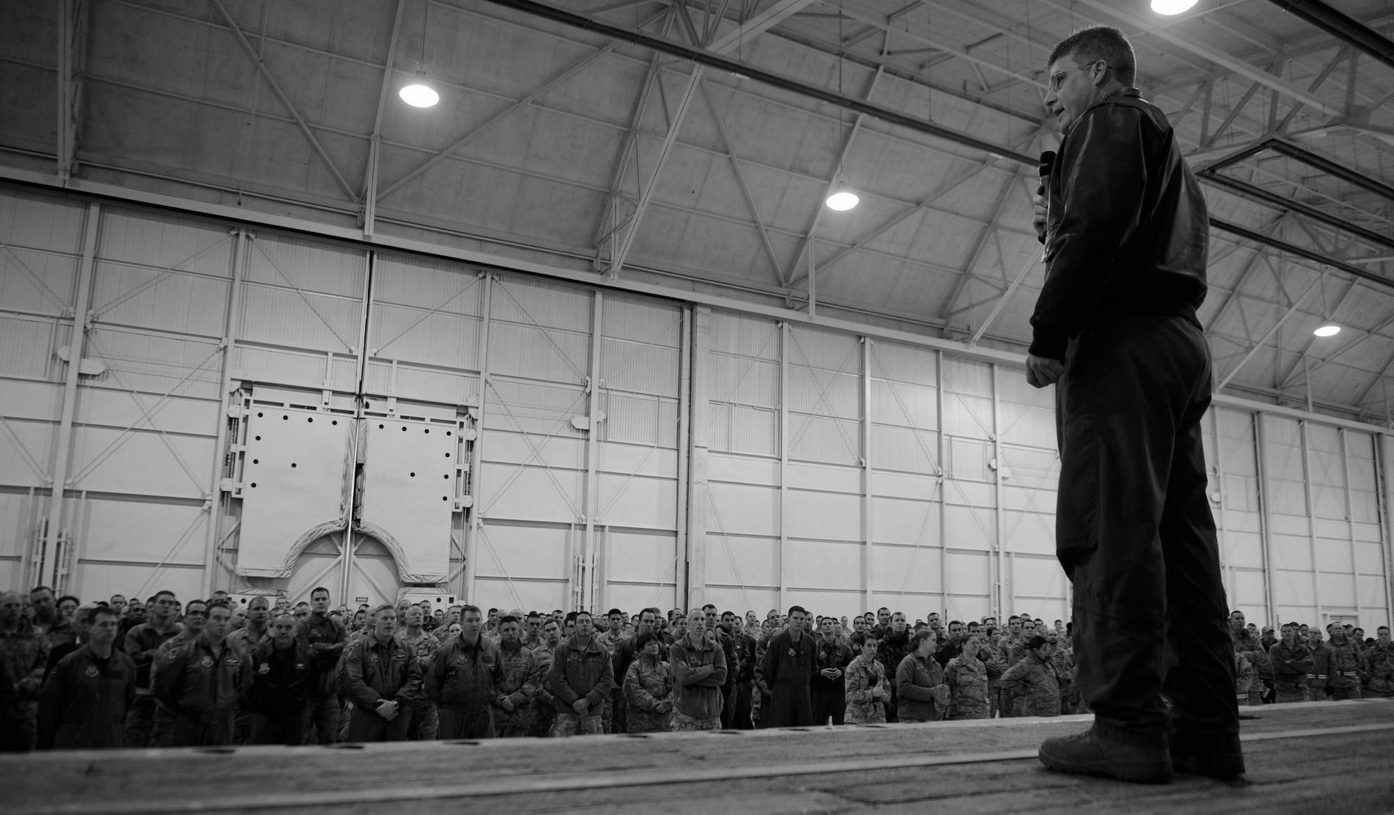 MOUNTAIN HOME AIR FORCE BASE, Idaho -- Col. Ron Buckley, 366th Fighter Wing commander, addresses airmen during a commander’s call Jan. 7 at Hangar 1331. The commander’s call covered many topics varying from suicide awareness, DUIs, and the upcoming unit compliance inspection.  (U.S. Air Force photo by Senior Airman Renishia Richardson)