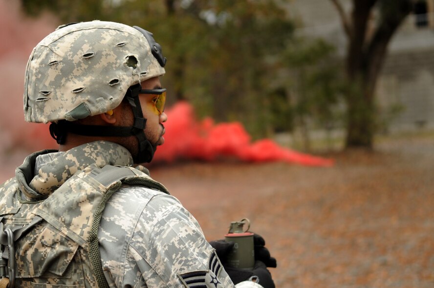 MOODY AIR FORCE BASE, Ga. -- Senior Airman Cory Black, 820th Base Defense Group fire team member, learns how to use an M18 smoke grenade Jan. 5. This was part of a three-week combat leaders course that taught NCOs and officers the skills to become squad leaders. (U.S. Air Force photo/Airman 1st Class Douglas Ellis)(RELEASED)
