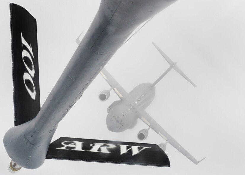 A C-17 Globemaster III approaches a KC-135 Stratotanker boom over Germany Nov. 12, 2010, during a training mission. The C-17 is with the Heavy Airlift Wing at Papa Air Base, Hungary, and the KC-135 is from the 100th Air Refueling Wing at Royal Air Force Mildenhall, England. (U.S. Air Force photo/Senior Airman Tabitha M. Lee)