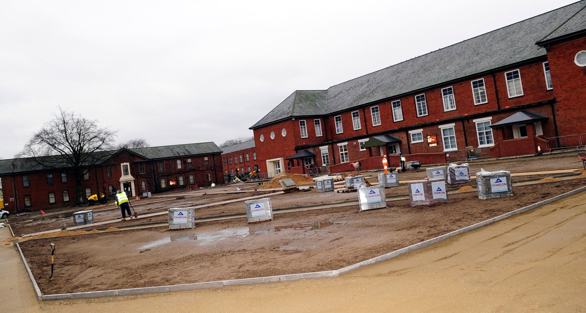 RAF MILDENHALL, England -- The Washington Square construction project is well under way, transforming it from a former parking lot to a walking campus Jan. 11, 2011.The project will also increase community safety by reducing current anti-terrorism and force protection vulnerabilities and providing a pedestrian-friendly environment free of vehicles. (U.S. Air Force photo/Senior Airman Ethan Morgan)