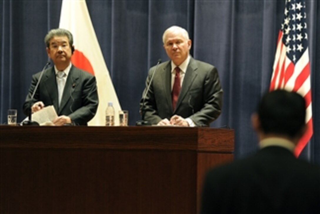Secretary of Defense Robert M. Gates and Japanese Defense Minister Kitazawa Toshimi listen to a reporter's question during a joint press conference in the Ministry of Defense in Tokyo, Japan, on Jan. 13, 2011.  