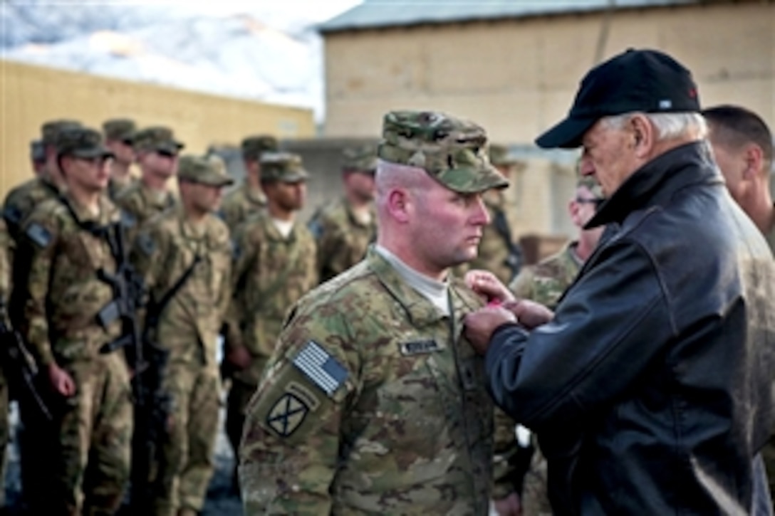 U.S. Vice President Joe Biden awards a Bronze Star to Staff Sgt. Workman on Forward Operating Base Airborne in Wardak province, Afghanistan, Jan. 11, 2011.