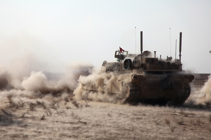 Marines with Delta Company, 1st Tank Battalion, 1st Marine Division (Forward), fires the main cannon of an M1A1 Abrams tank during a range at Camp Leatherneck, Jan. 13, 2011. The Marines are the first tank unit to deploy to Afghanistan.