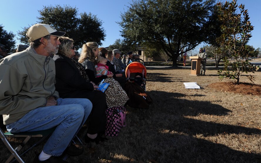 MOODY AIR FORCE BASE, Ga.-- Family members of Airman 1st Class Simon Martin and wife, Valerie, came  to witness the dedication of a magnolia tree in honor of their deceased family member, Karson Thomas Martin Jan. 14. A stone monument was added at the base of the tree by the 23rd CS to officially dedicate the planted magnolia tree to Karson, who died in a car accident May 2010.  (U.S. Air Force photo/Airman 1st Class Benjamin Wiseman)(RELEASED)
