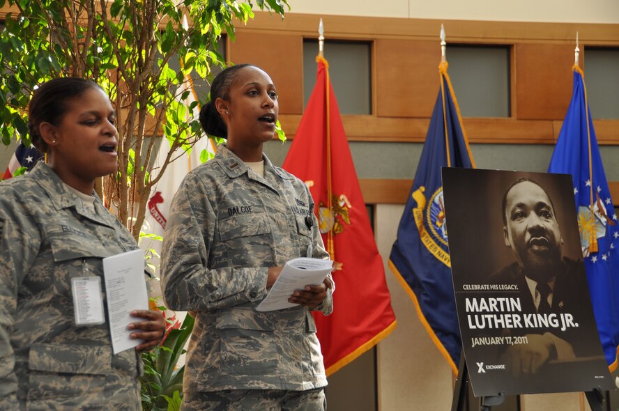 Master Sgt. Deborah E. Elliott and 2nd Lt. Micah Dalcoe sing "Keep Your Eyes on the Prize," during the Rev. Dr. Martin Luther King, Jr., Commemoration Service at the Charles C. Carson Center for Mortuary Affairs Jan. 14, 2011. (U.S. Air Force photo/Christin Michaud)