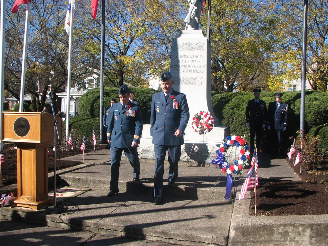 Canadian Forces Rome Detachment Commander LCol Joseph MacMillan (left) and Canadian Forces Warrant Officer Duane Feltham return to posts after laying a wreath at Rome, N.Y.'s Veterans Memorial. Nov. 11 is commemorated as Remembrance Day in Canada and pays tribute to all Canadians who have served the cause of freedom. 