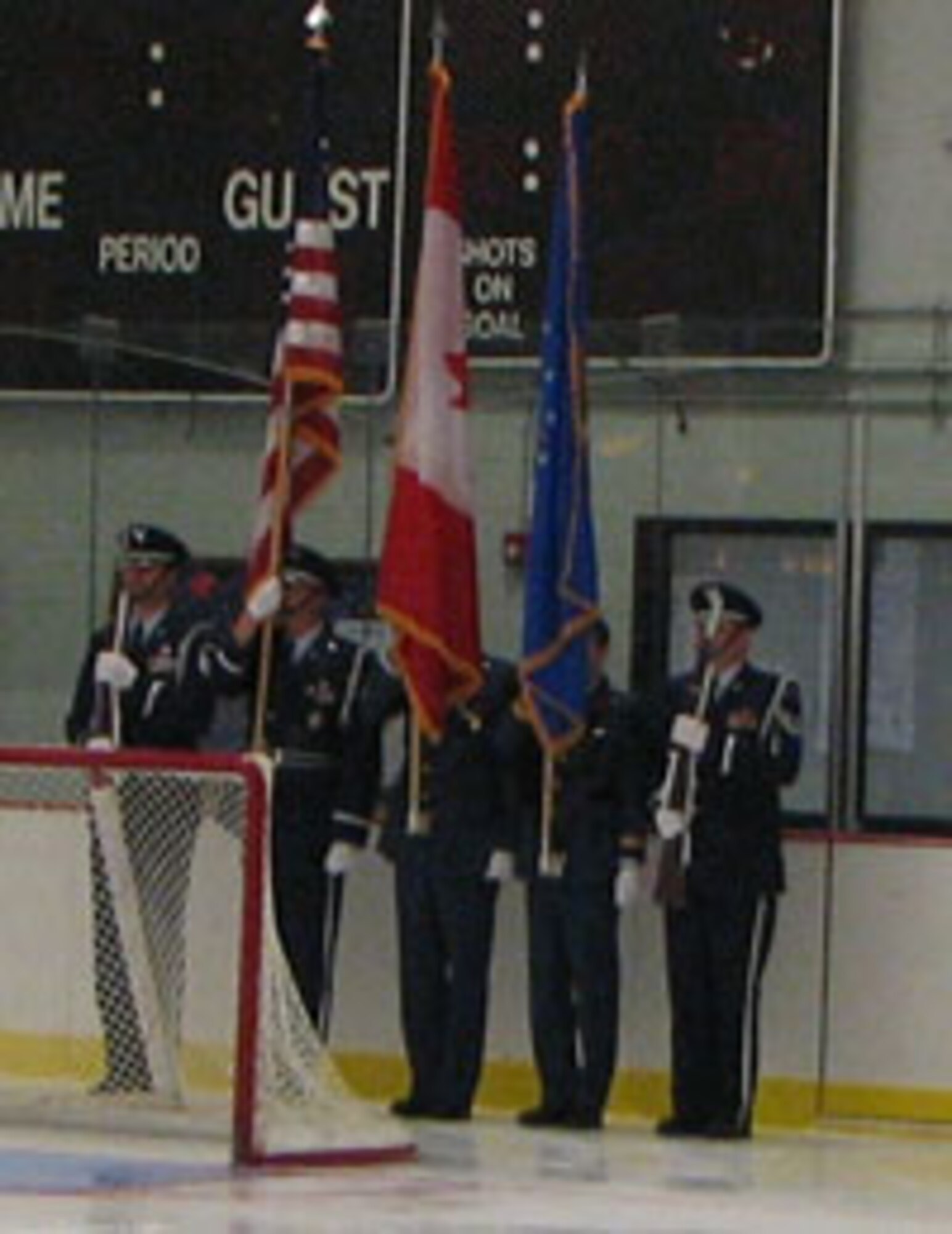 EADS bi-national honor guard presented the American and Canadian colors at the Rome Frenzy’s home ice opener. From left to right, honor guard members are: Master Sergeant Thomas Whiteman, Master Sergeant Jeffrey LaMarche, Warrant Officer Duane Feltham, Canadian Forces; Lieutenant Jonathan Hillman, Canadian Forces; and Technical Sergeant James Mauthe. 