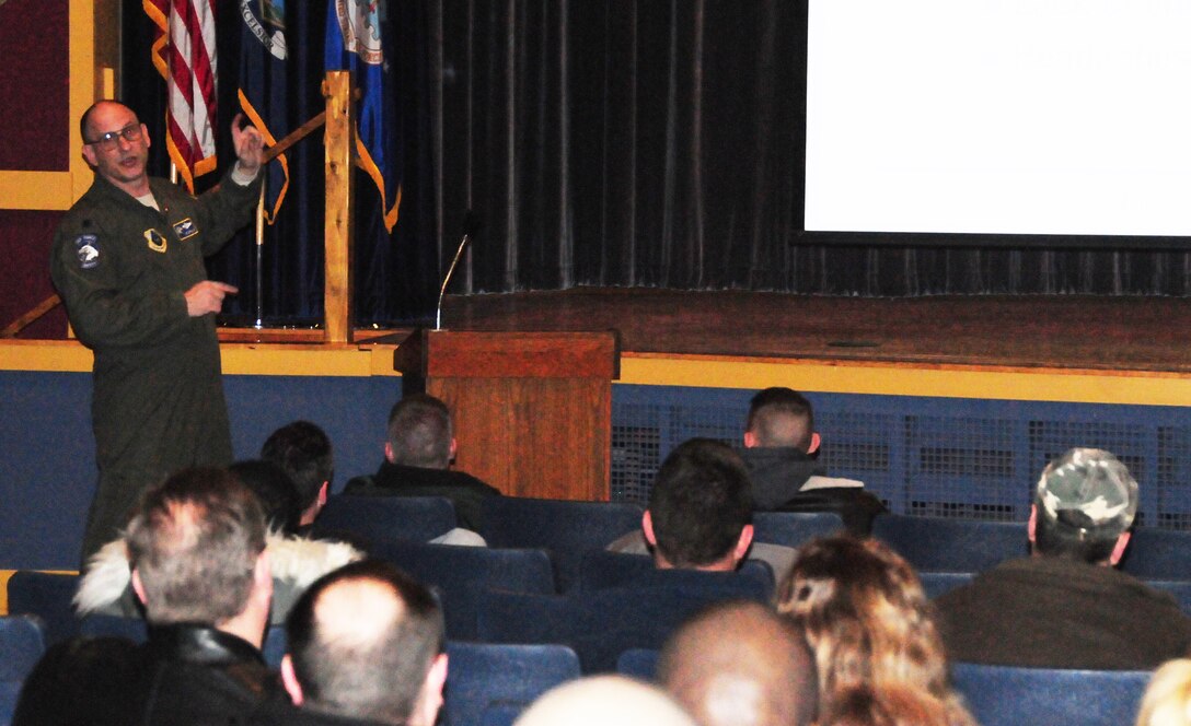 NIAGARA FALLS AIR RESERVE STATION, N.Y- Members of the 914th and 107th Maintenance groups receive a joint safety brief from Lt. Col. Eric Dopslaff, Chief of Human Factors Investigations, Air Force Safety Center, Kirkland AFB, New Mexico. The brief was all part of the "Winter Wingman Day 2011" traditionally known as a safety down day. (U.S. Air Force Reserve photo by Mr. Peter Borys)
