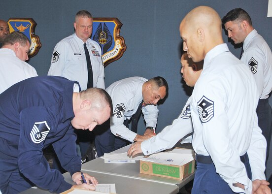Students signing in for the five-day First Sergeant symposium. Photo by Todd Berenger.