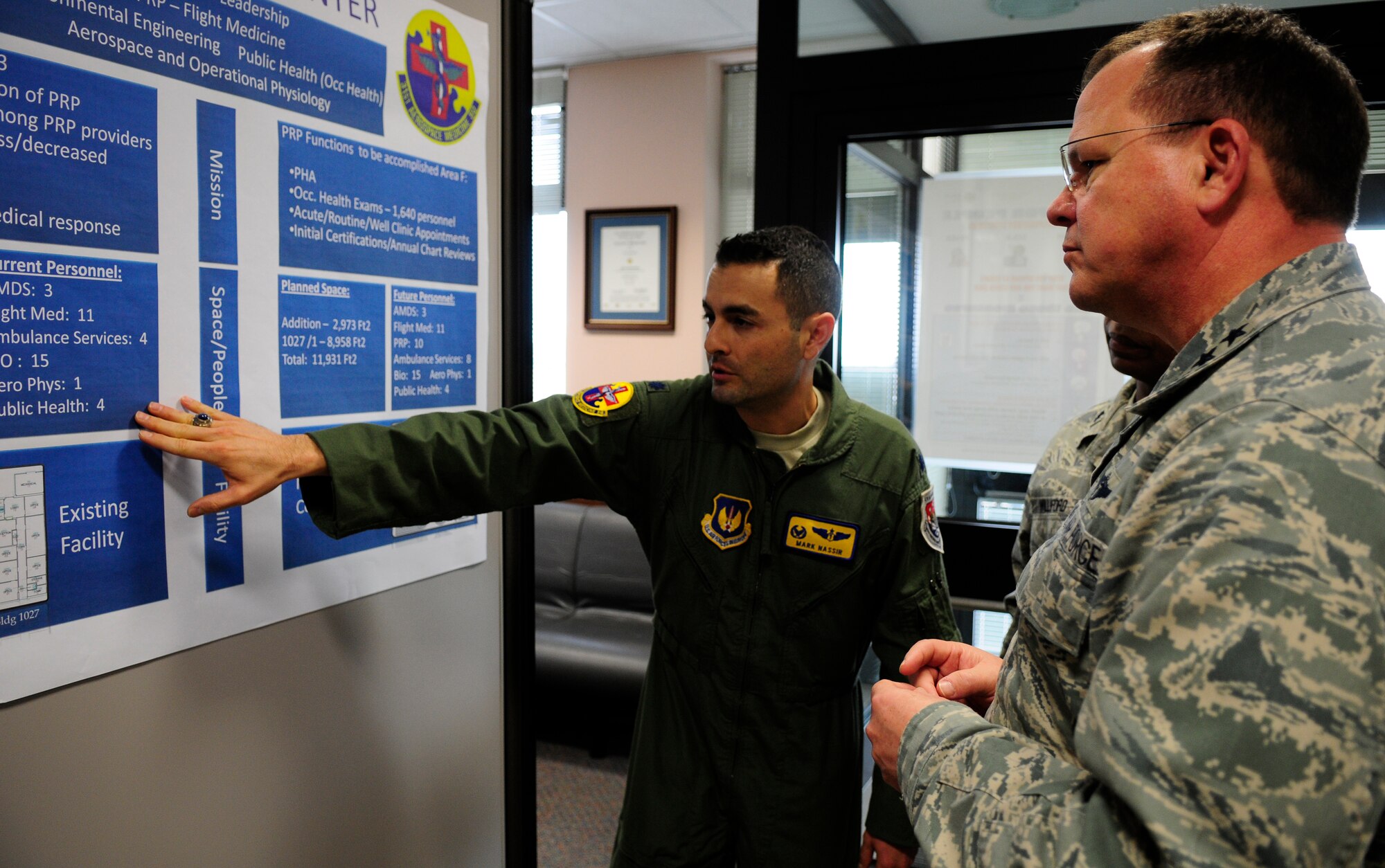 Lt. Col. Mark Nassir, 31st Aerospace Medicine Squadron, shows Lt. Gen. (Dr.) Charles B. Green, Air Force Surgeon General, plans for the new 31st AMDS building Jan. 12.  Aviano Air Base was the first stop on the surgeon general’s USAFE tour, which aims to educate military health care providers on a new initiative that will be implemented in June 2011. (U.S. Air Force photo by Airman 1st Class Katherine Windish)