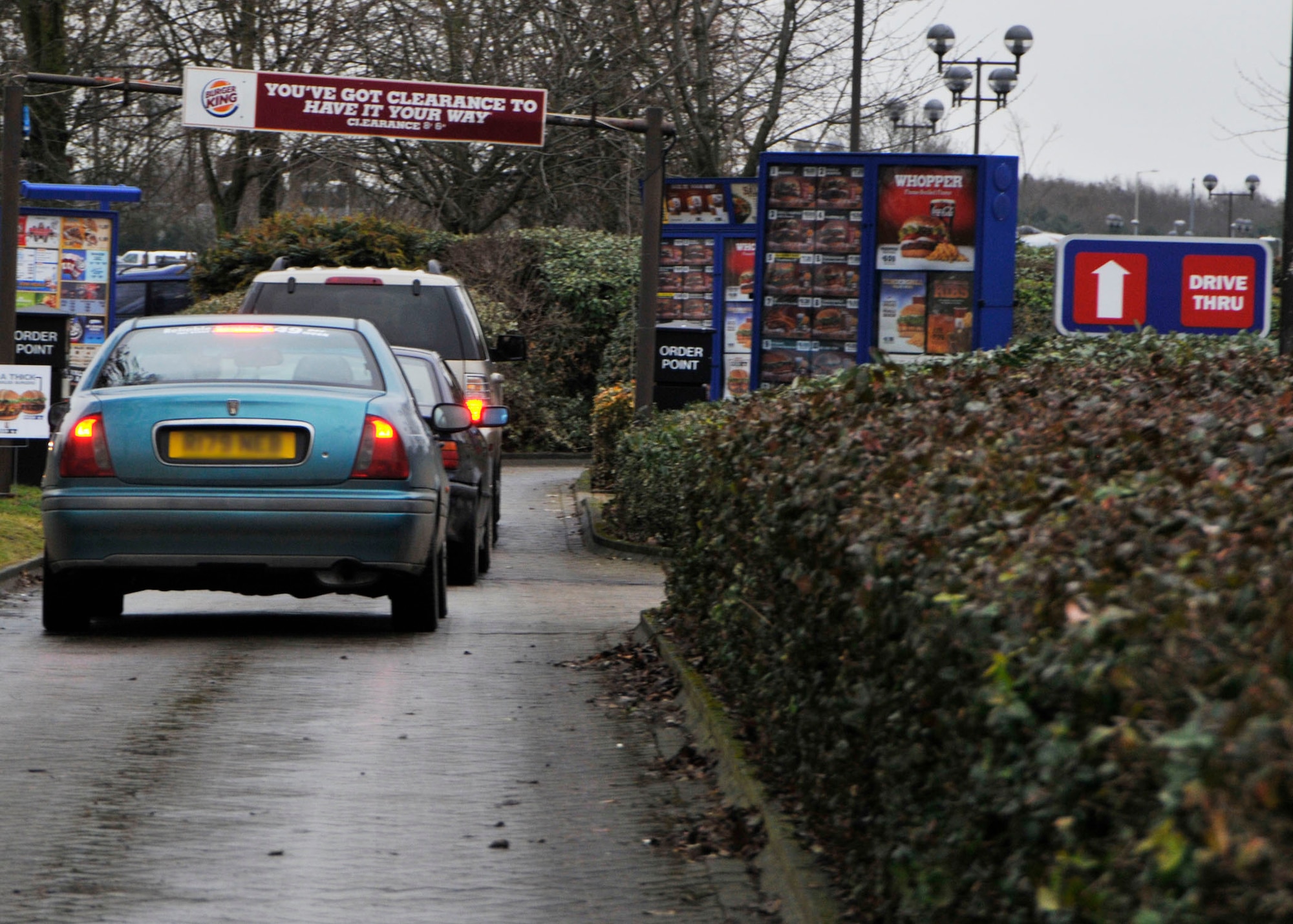 ROYAL AIR FORCE LAKENHEATH, England -Cars line up in a drive-thru to get fast food for lunch on Jan. 11. Airmen on the go may go through the drive-thru for convenience but by getting smaller portions of food or choosing grilled chicken over fried, they can still be healthier. (U.S. Air Force photo/Senior Airman Tiffany M. Deuel)