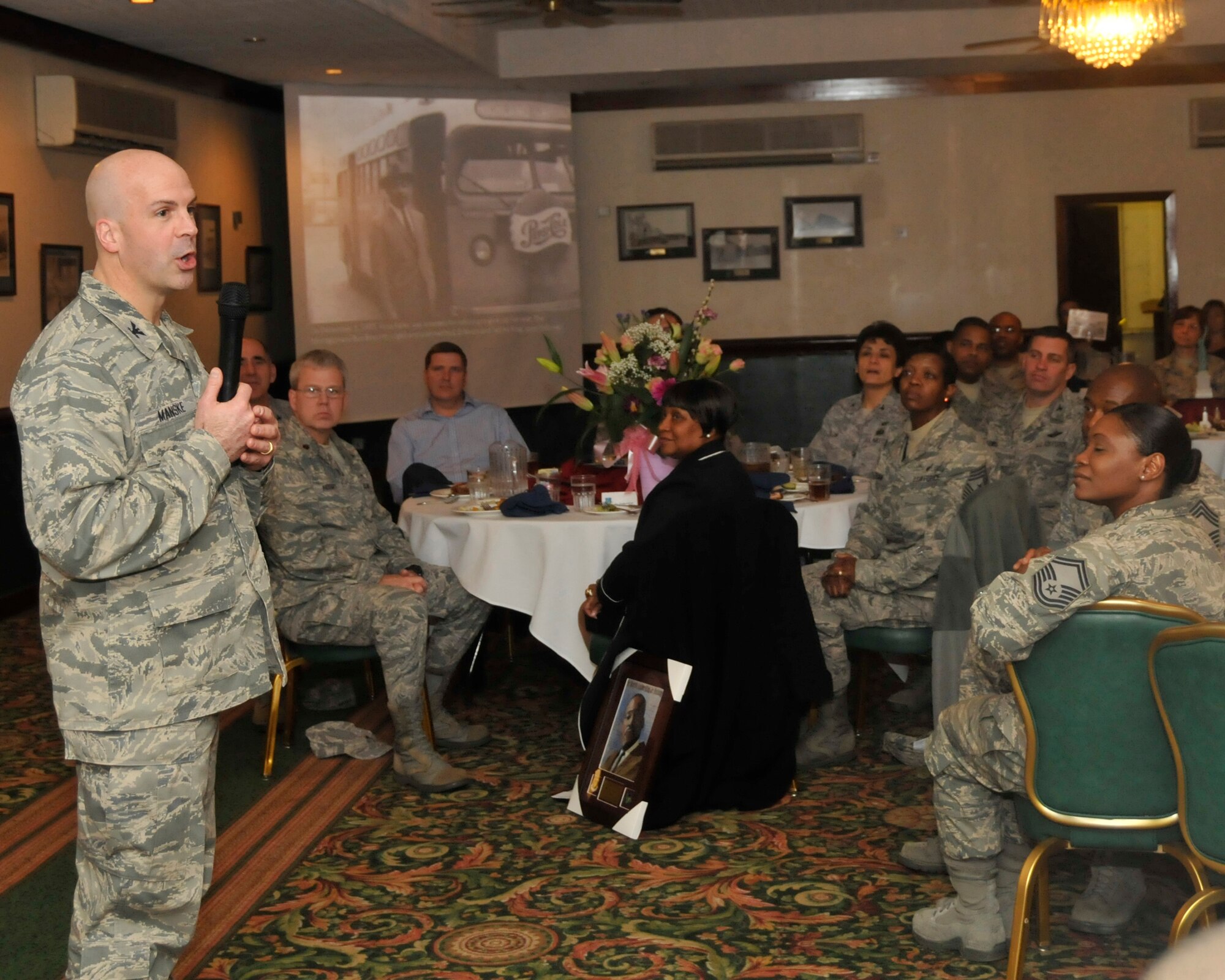 ROYAL AIR FORCE LAKENHEATH, England -- Col. Chad Manske, 100th Air Refueling Wing commander, gives closing remarks during the Martin Luther King at Eagles Landing on Jan. 13. Dr. Sutherland, RAF Lakenheath Elementary School assistant principal, was the guest speaker for the luncheon.  (U.S. Air Force photo/ Airman 1st Class Eboni Reams)