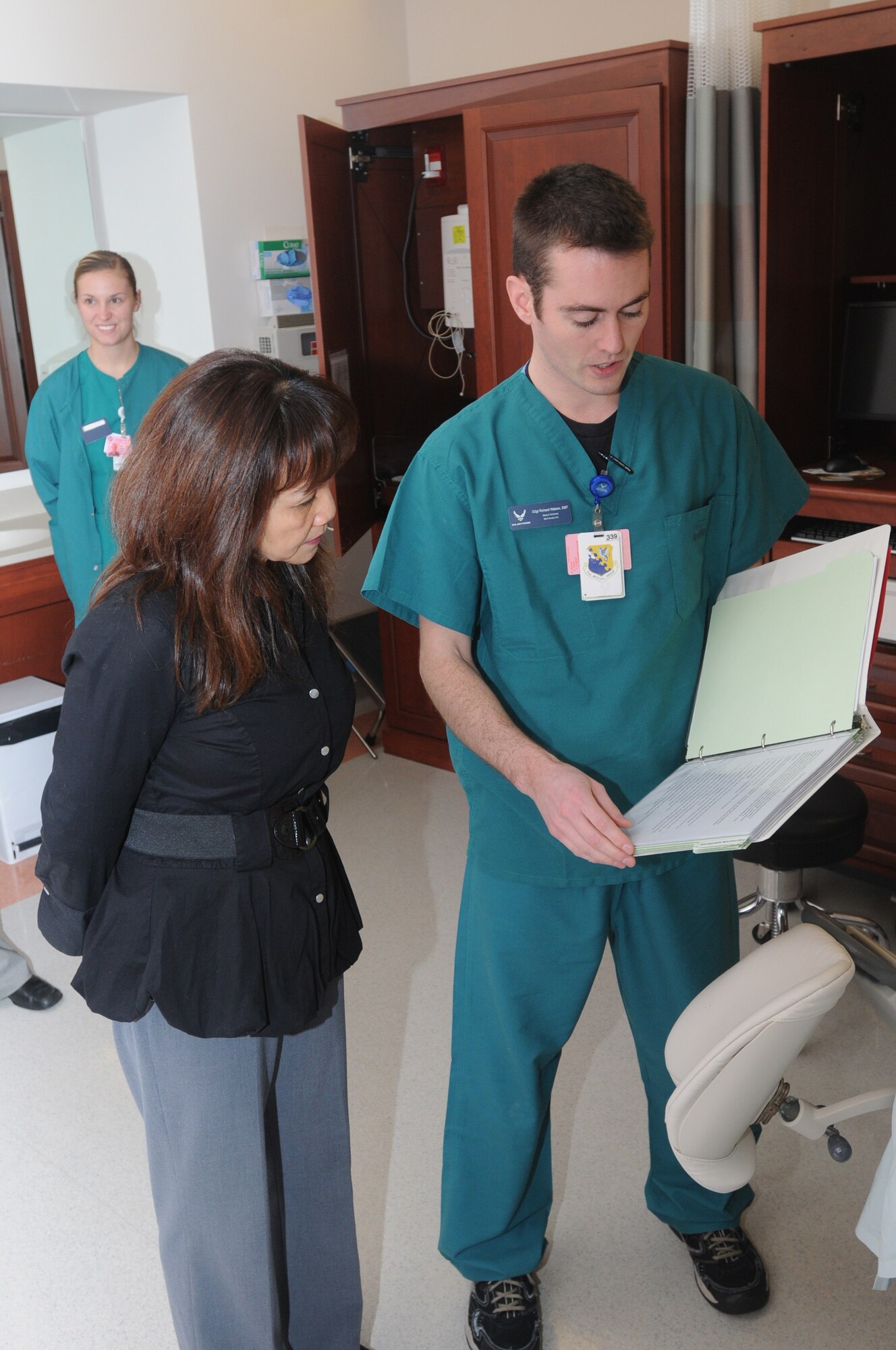 Staff Sgt. Richard Watson, 31st Surgical Operations Squadron medical technician, shows Mary Williamson, wife of Chief Master Sgt. David W. Williamson, U.S. Air Forces in Europe command chief, the emergency procedures for women in labor. Mrs. Williamson, and Betty Welsh, wife of Gen. Mark A. Welsh III, USAFE commander, toured the 31st Medical Group hospital during their visit to Aviano Air Base, Italy, Jan. 10-11. (U.S. Air Force photo/Airman 1st Class LaVel Sterling)