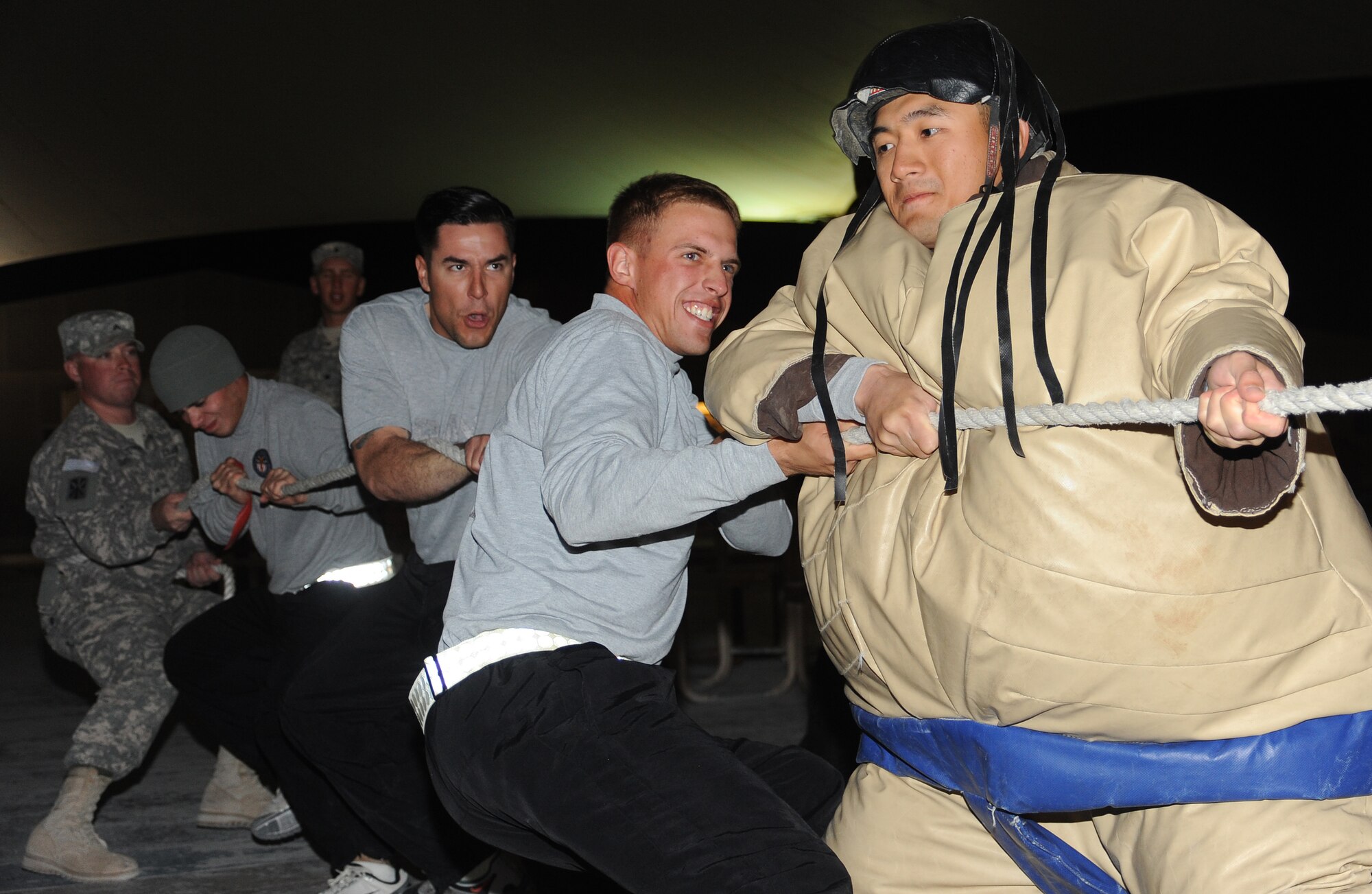 A team of Army soldiers pull their way during a tug of war competition at the Memorial Plaza, Jan. 13. At the end of the relay the team with the most points won the challenge.  (U.S. Air Force photo/Staff Sergeant Liliana Moreno) (RELEASED)                             
