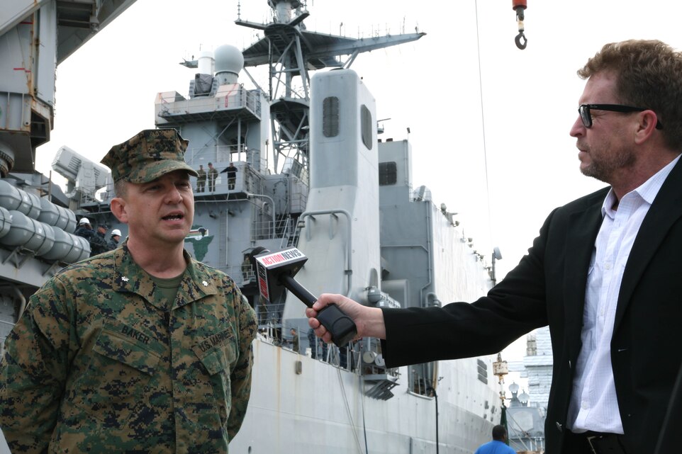 Marine Corps Lt. Col. Paul Baker, Security Cooperation Task Force (SCTF) commander, speaks with local media about Amphibious Southern Partnership Station 2011 (A-SPS 11). The role of SCTF within A-SPS 11 is to conduct subject matter expert exchanges (SMEE’s) with partner nation military and security forces that develop and test participating regional services’ capabilities to respond to a wide variety of maritime missions.