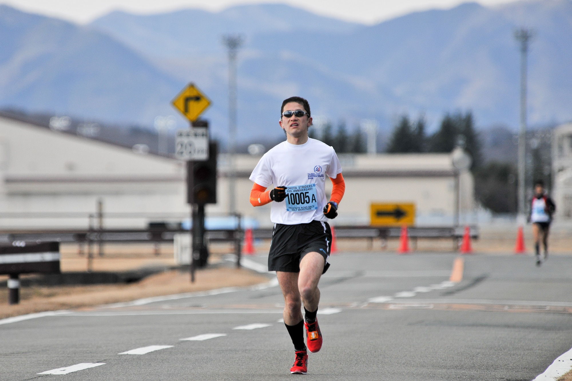 YOKOTA AIR BASE, Japan -- Yokota Striders Running Club sponsored the 30th Annual Frostbite Run here, Jan. 16. Over 6,000 runners participated in the event. Kouichiro Yamanaka got third place, finishing with a time of 1:09:15. (U.S. Air Force photo/Osakabe Yasuo) 
