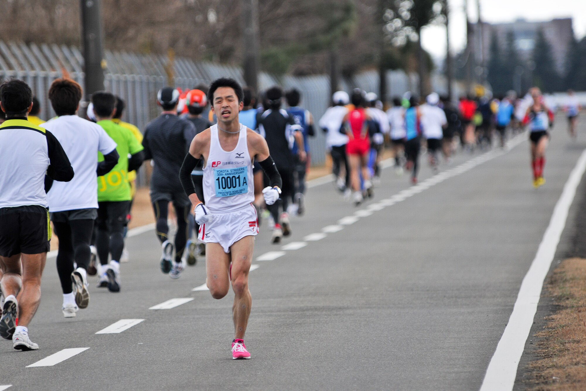YOKOTA AIR BASE, Japan -- The Yokota Striders Running Club sponsored the 30th Annual Frostbite Run here, Jan. 16. Over 6,000 runners participated in the event. Youichi Kouno won first place, finishing with a time of 1:08:37. Kouno was the winner last year as well. (U.S. Air Force photo/Osakabe Yasuo)