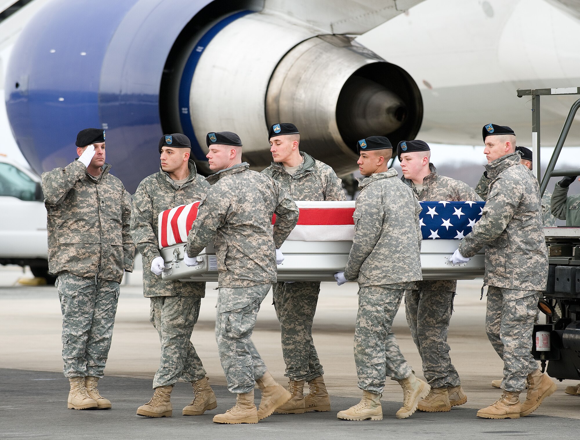 A U.S. Army carry team transfers the remains of Army Spc. Martin J. Lamar of Sacramento, Calif., at Dover Air Force Base, Del., Jan. 17, 2011. (U.S. Air Force photo/Jason Minto)