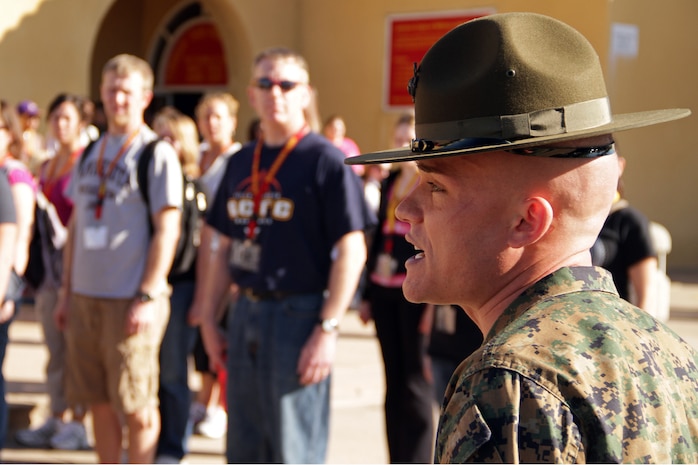 Senior Drill Instructor Sgt. Evan Harstine, 27, from Albuquerque, N.M., gives teachers and school administrators a taste of Marine Corps boot camp Jan. 18 during the 2011 Recruiting Station Twin Cities Educators' Workshop. Harstine, who put eight platoons through boot camp, will complete his three-year tour as a drill instructor with 2nd Recruit Training Battalion in February. Thirty-seven educators from Minnesota and North Dakota attended the workshop. For more photos of the event, visit the RS Twin Cities fan page at www.facebook.com/rstwincities.