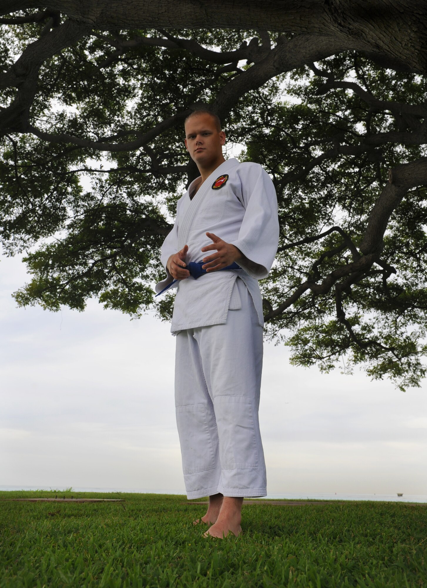 Airman 1st Class Brandon Laflin, 15th Aermedical Dental Squadron bio-environmental engineer, is the Hickam Warrior. Airman Laflin has been studying JuJitsu for two years and said that it helps him perform better both mentally and physically at work. (U.S. Air Force photo/Airman 1st Class Lauren Main)