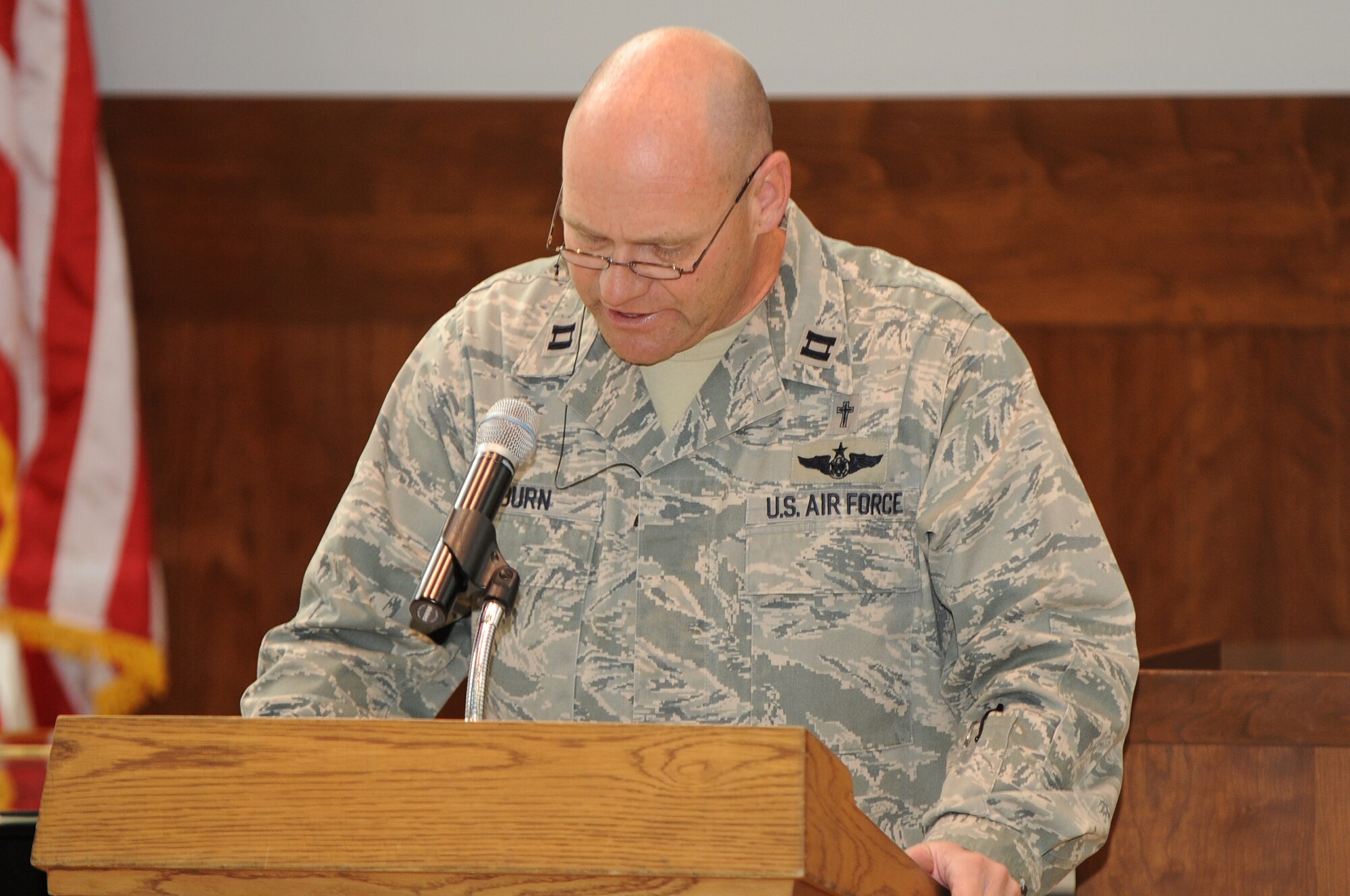 BUCKLEY AIR FORCE BASE, Colo.--Chaplain Capt. Gary Coburn speaks to members of team Buckley at the Dr. Martin Luther King Jr. Holiday event, Jan. 14, 2011. Capt. Coburn spoke about his experiences growing up during the time of racism and Dr. King.  (U.S. Air Force photo by Airman Manisha Vasquez) 