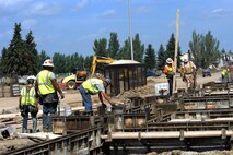 MINOT AIR FORCE BASE, N.D. –Construction workers lay down new foundations for base housing here Aug. 6, 2010. The base housing expansion continues and will help decrease the waiting for homes for incoming service members. (U.S. Air Force photo/Airman 1st Class Aaron-Forrest Wainwright) 