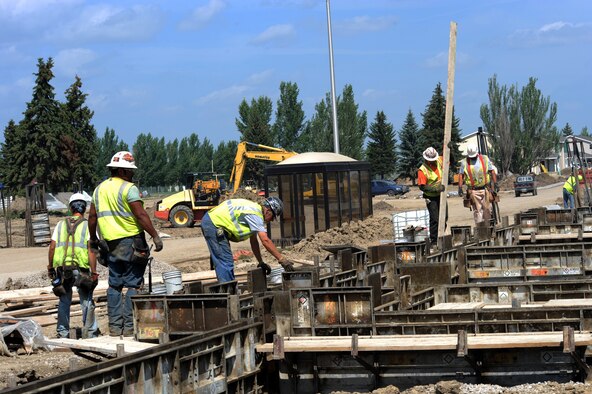 MINOT AIR FORCE BASE, N.D. –Construction workers lay down new foundations for base housing here Aug. 6, 2010. As base housing expansion continues, the privatization process is also underway, ensuring the needs of base residents will continue to be met. (U.S. Air Force photo/Airman 1st Class Aaron-Forrest Wainwright) 

