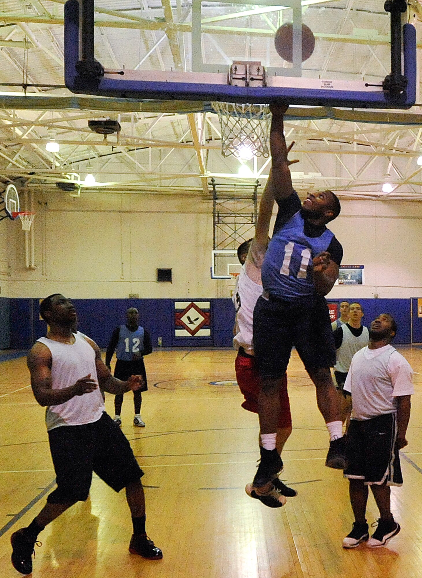 The 436th Aircraft Maintenance Squadron battles the 436th Comptroller Squadron Jan. 13 at the Fitness Center.  This match up was part of the week five schedule where some exciting games took place (for more details see article). (U.S. Air Force photo/Airman 1st Class Jacob Morgan).