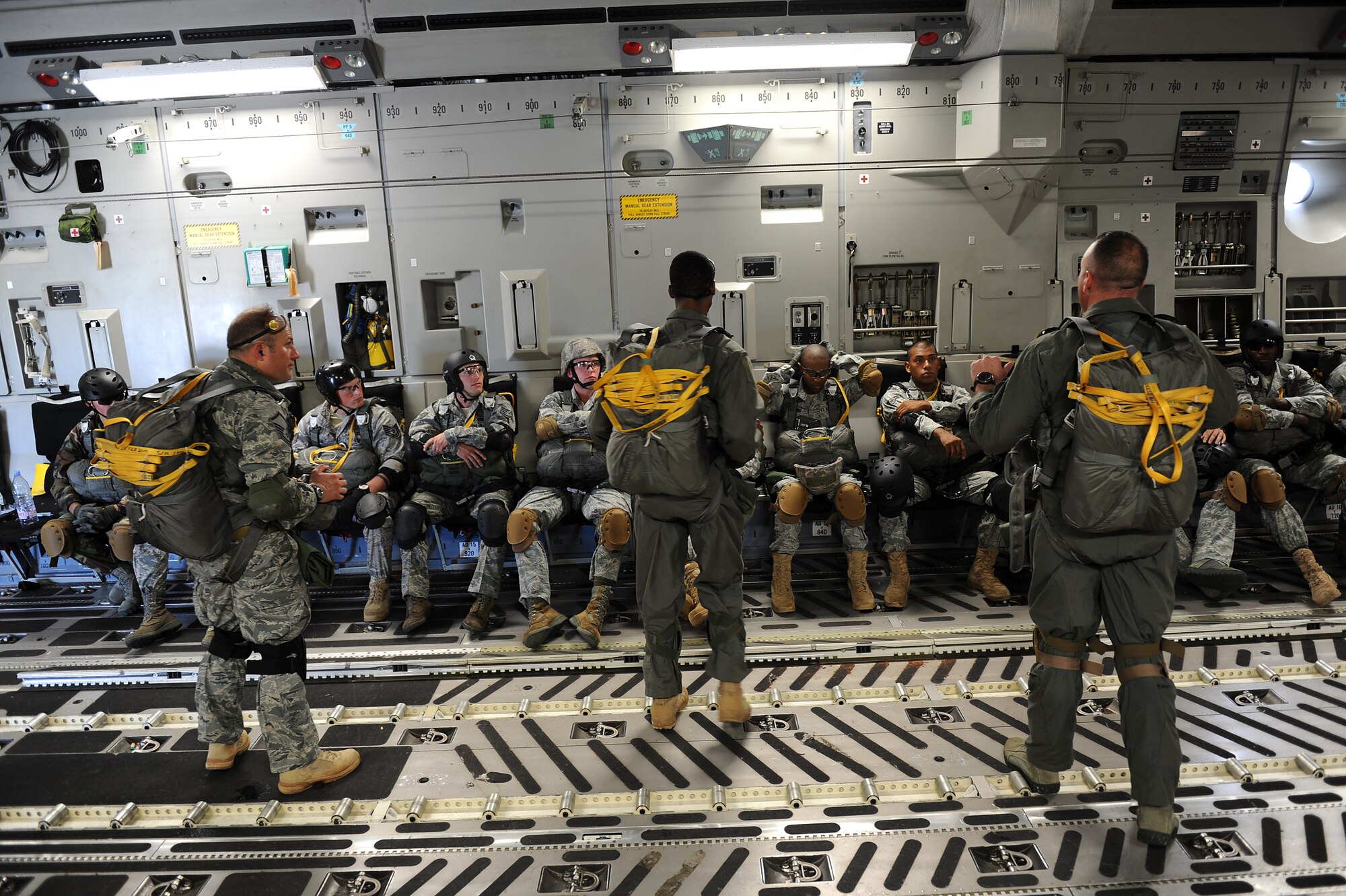 The 36th Contingency Response Group jumpmasters go over the details of the afternoon static line jumps during proficiency training Jan. 13.  Hickam aircrew from the 535th Airlift Squadron provided four static line jumps for the 36th CRG?s proficiency training over two separate days. (U.S. Air Force photo/Staff Sgt. Mike Meares)