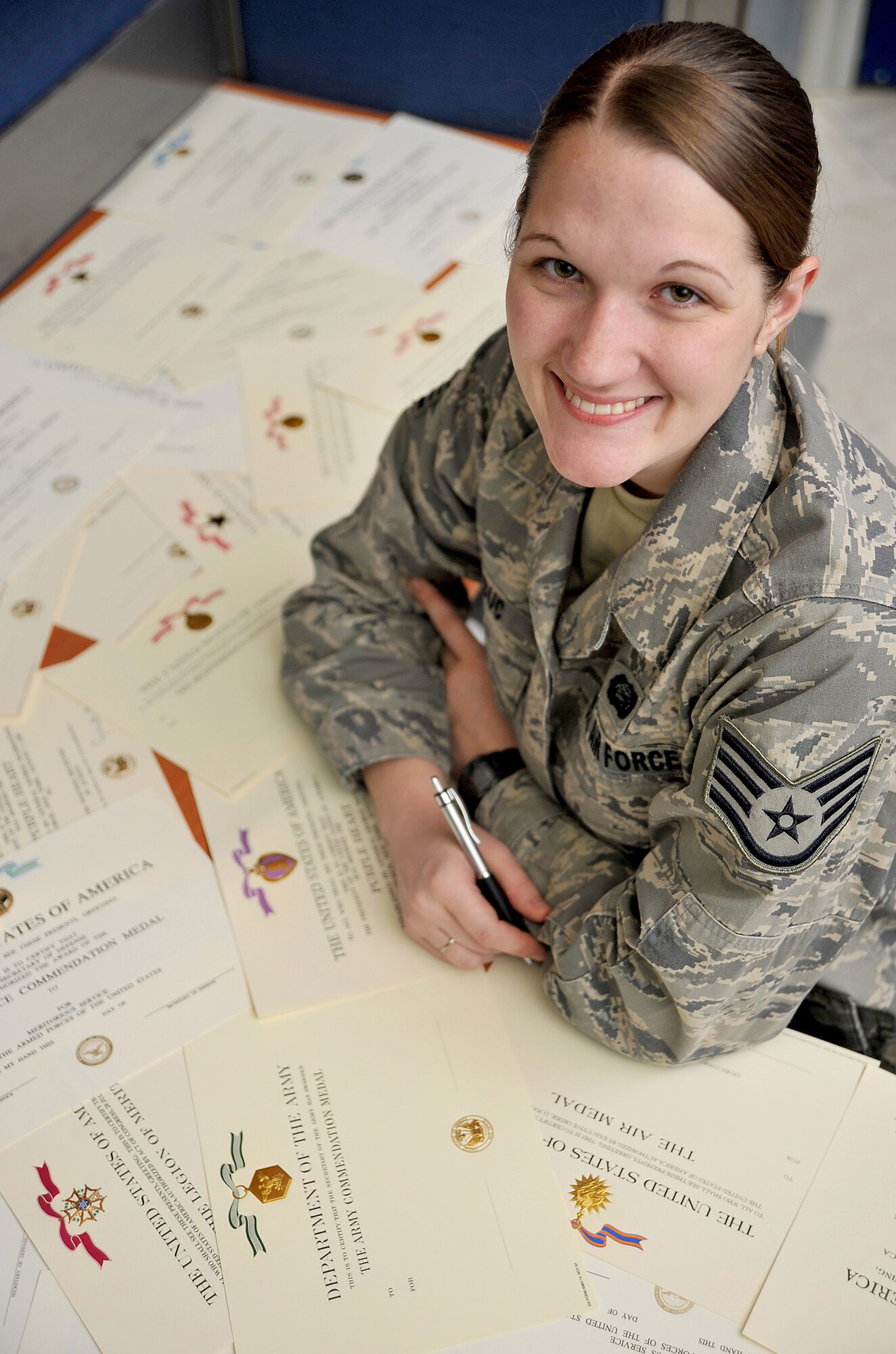 Staff Sgt. Ashley Le Duc poses for a photo Jan. 18, 2011, at Camp Victory, Iraq. Sergeant Le Duc is a manpower and personnel awards NCO. She works in a joint military unit combined with members of the Air Force, Army, Navy and Marines. (U.S. Air Force photo/Senior Airman Andrew Lee)