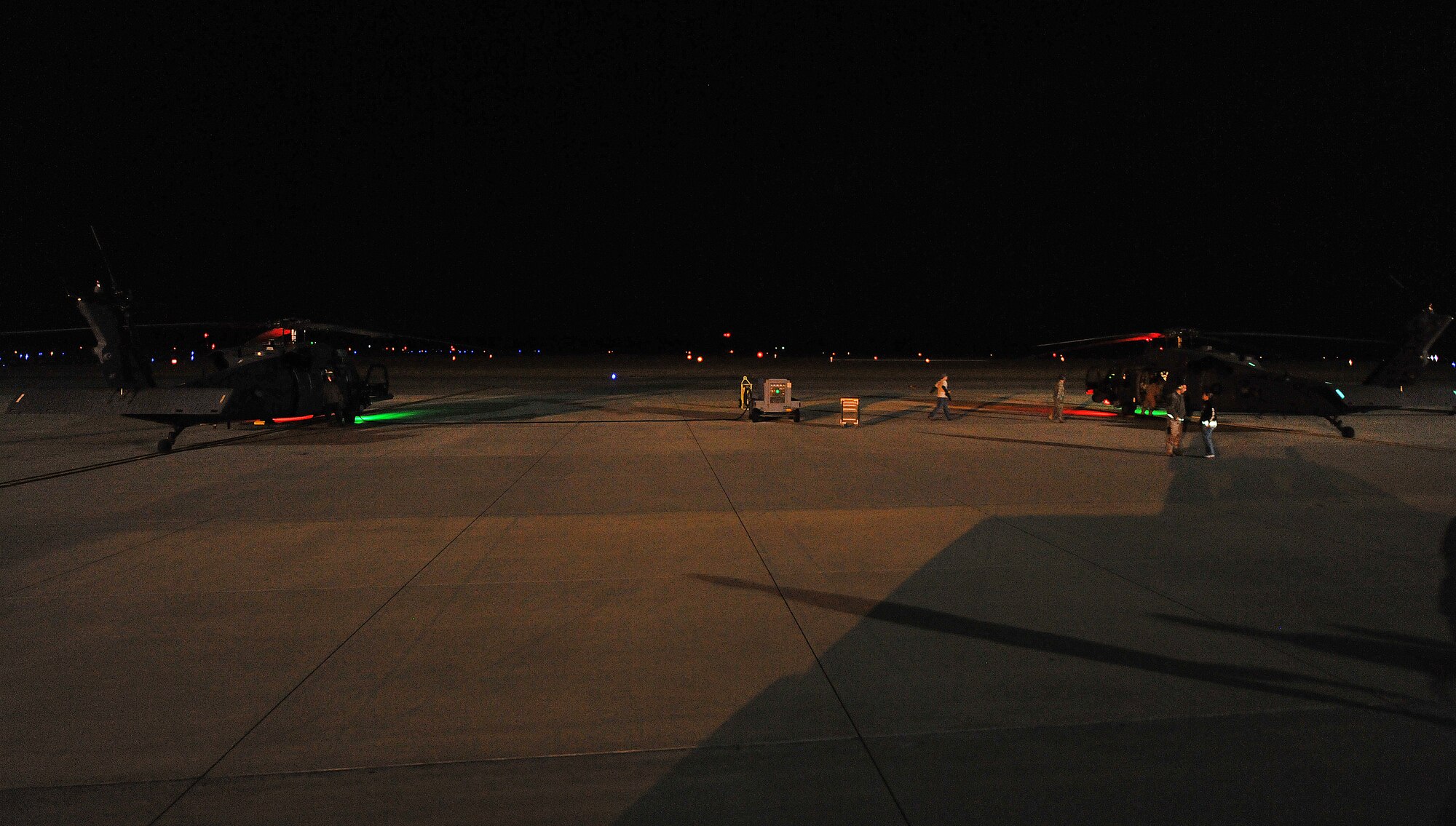 MOODY AIR FORCE BASE, Ga.-- Two HH-60G Pavehawks, carrying members from the
41st and 38th Rescue Squadron, prepares for take-off for a mission providing
support to local authorities in help of search for a missing teenager Jan.
15. (U.S. Air Force photo/Airman 1st Class Joshua Green)(RELEASED)
