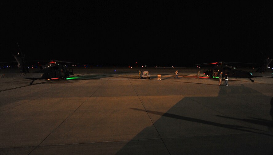 MOODY AIR FORCE BASE, Ga.-- Two HH-60G Pavehawks, carrying members from the
41st and 38th Rescue Squadron, prepares for take-off for a mission providing
support to local authorities in help of search for a missing teenager Jan.
15. (U.S. Air Force photo/Airman 1st Class Joshua Green)(RELEASED)
