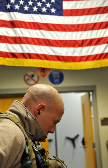 MOODY AIR FORCE BASE, Ga.-- A member from the 41st Rescue Squadron, takes a
quick mental and equipment check before leaving for a rescue mission Jan.
15. Local authorities needed aid in search for a missing teenager and
Moody's rescue squadrons stepped up to provide support. (U.S. Air Force
photo/Airman 1st Class Joshua Green)(RELEASED)
