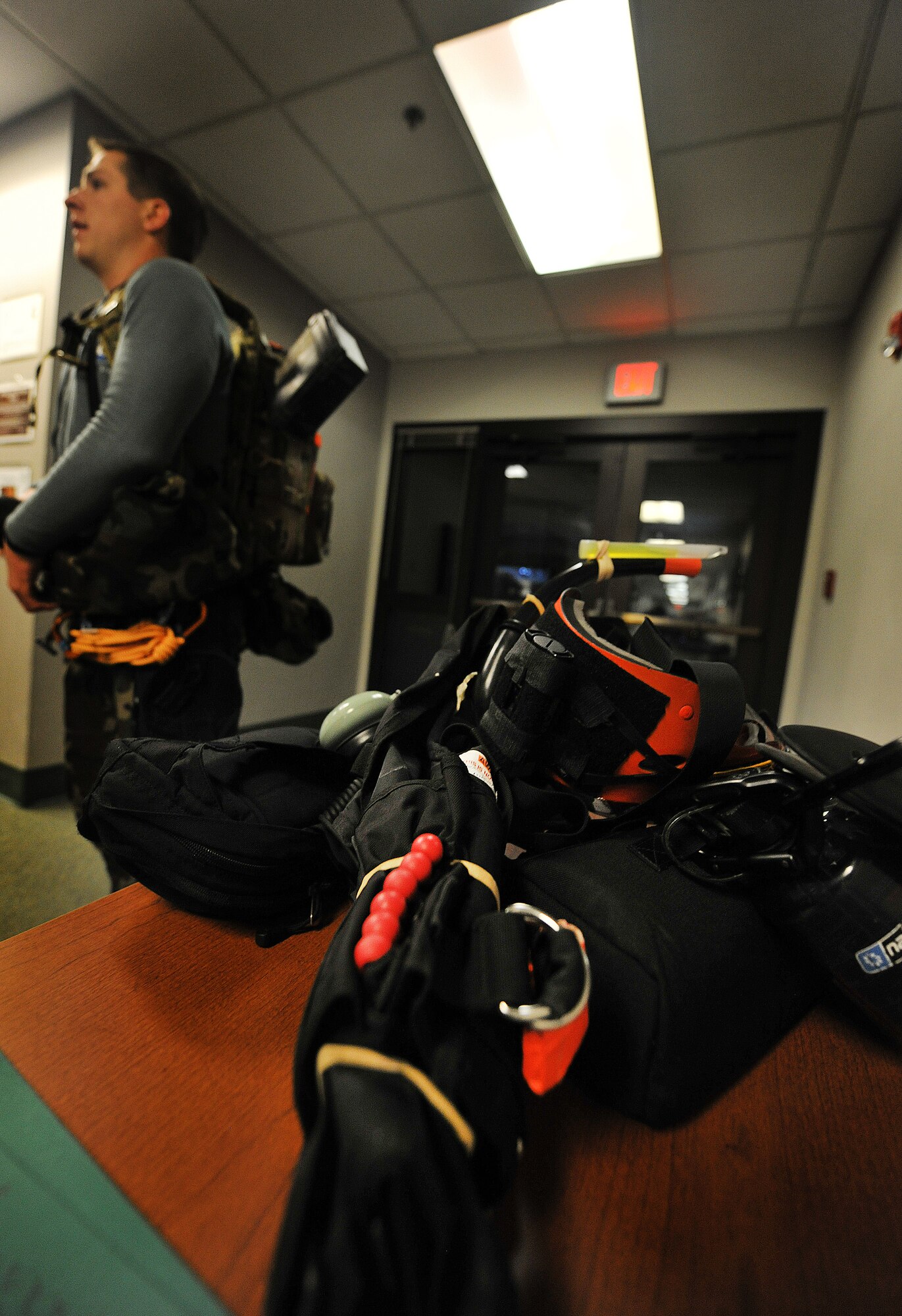 MOODY AIR FORCE BASE, Ga.-- Equipment from the 38th Rescue Squadron sits on
a table prior to a search and rescue mission Jan. 15. Members from the 41st
and 38th Rescue Squadrons provided support to local authorities to help
search for a missing teenager. (U.S. Air Force photo/Airman 1st Class Joshua
Green)(RELEASED)
