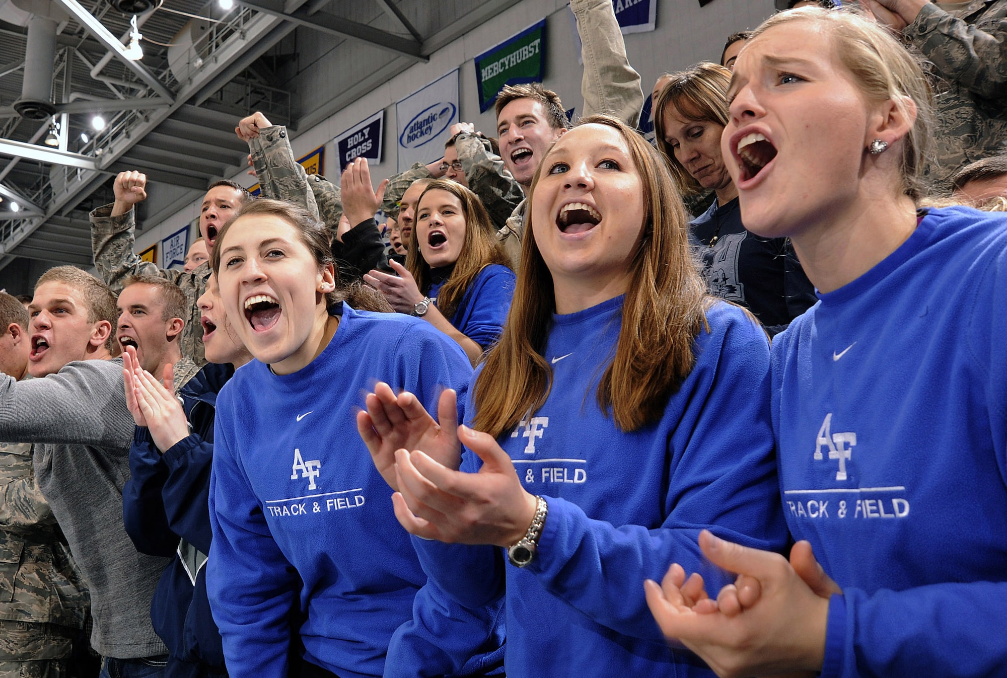 Air Force Academy cadets cheer for their Falcons hockey team during a match against Army Jan. 15, 2011, at the Cadet Ice Arena. The crowd of 3,019 was the second-largest of Air Force's season. Air Force and Army split the series, with the Falcons winning, 5-1, Jan. 14 and losing, 5-4, Jan. 15. (U.S. Air Force photo/Mike Kaplan) 