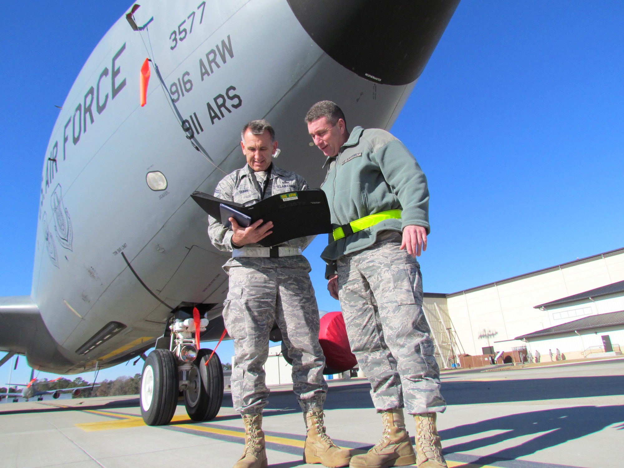Senior Master Sgt. David Dunn (left), chief of quality assurance for the 916th Maintenance Group, was named the Air Force Reserve nominee for the 2010 Government Employees Insurance Company (GEICO) Military Service awards. (USAF photo by MSgt. Wendy Lopedote, 916ARW/PA)                    