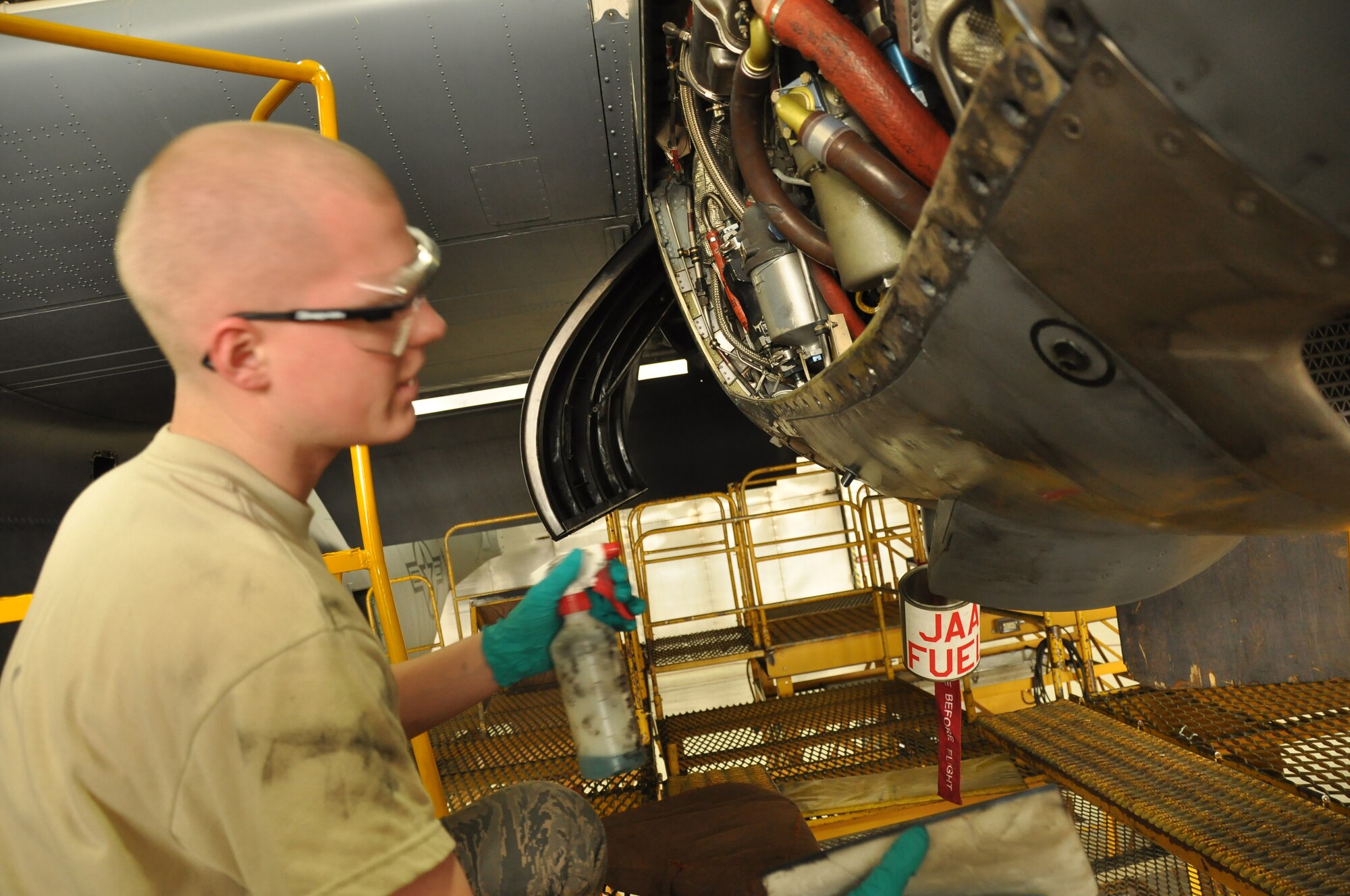 Airman Christopher Becker, 934th Maintenance Squadron engine specialist, washes down the engine of a C-130 Hercules at the Minneapolis-St. Paul IAP ARS, Minn (Air Force Photo/Tech. Sgt. Bob Sommer)