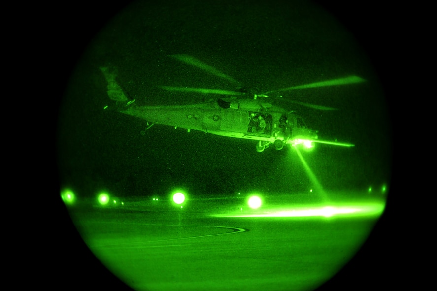MOODY AIR FORCE BASE, Ga.-- An HH-60G Pavehawk helicopter from the 41st Rescue Squadron lifts off to aid local authorities with a search and rescue mission for a missing local teenager Jan. 15. Two helicopters from the 41st RQS were sent to provide aerial support to the local authorities.(U.S. Air Force photo/Airman 1st Class Benjamin Wiseman)(RELEASED)